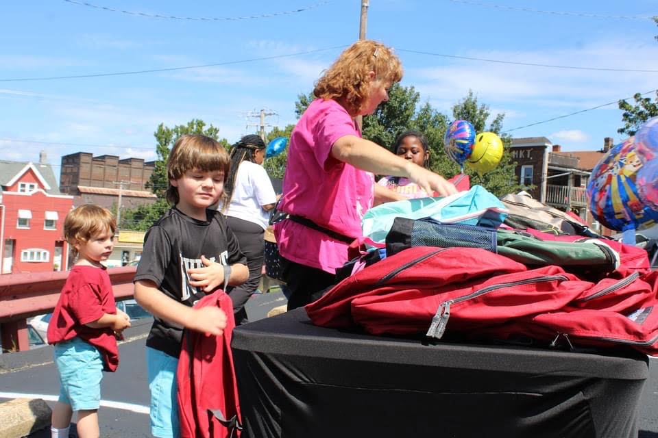 Community Block Party with backpack giveaways